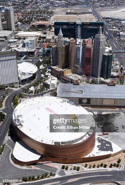 An aerial view shows New York-New York Hotel & Casino and T-Mobile Arena, home of the NHL's Vegas Golden Knights, both of which have been closed...