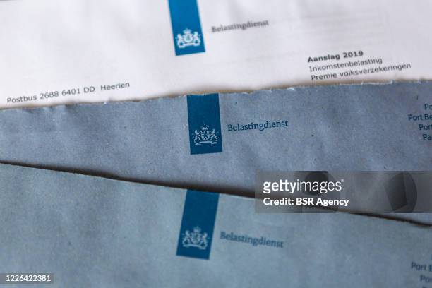 General view of the typical blue envelopes of the Belastingdienst, the Dutch tax authorities, on May 18, 2020 in Duiven, Netherlands.