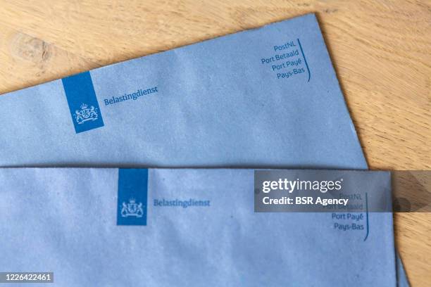 General view of the typical blue envelopes of the Belastingdienst, the Dutch tax authorities, on May 18, 2020 in Duiven, Netherlands.