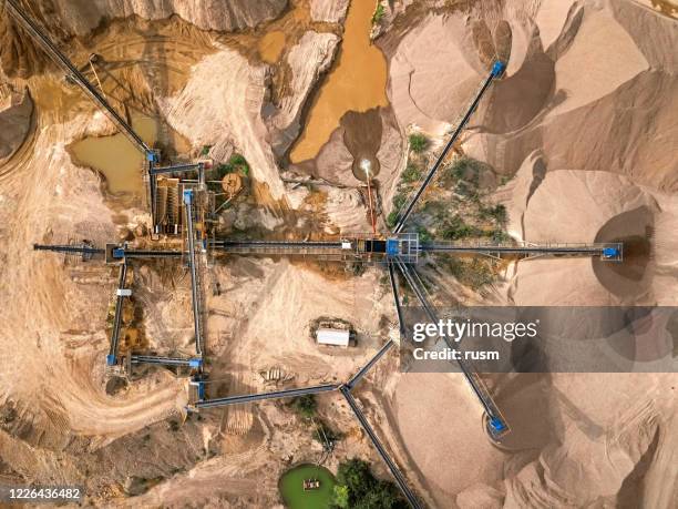 overhead aerial view of crushed stone quarry machine - mining from above stock pictures, royalty-free photos & images