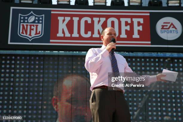 Host Rich Eisen has some opening remarks when Usher performs at the National Football League's Kickoff Concert at Columbus Circle on September 4,...