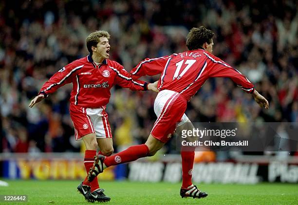 Juninho of Middlesbrough celebrates Christian Ziege's goal during the FA Carling Premiership match against Everton at the Riverside in Middlesbrough,...