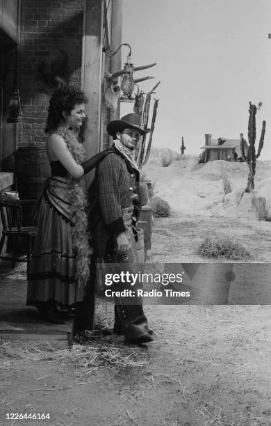 Comedian Kenny Everett and actress Cleo Rocos filming a sketch for the BBC television series 'The Kenny Everett Television Show', January 8th 1984.