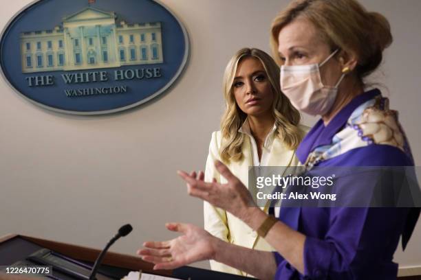 White House coronavirus response coordinator Deborah Birx speaks as White House Press Secretary Kayleigh McEnany looks on during a news briefing at...