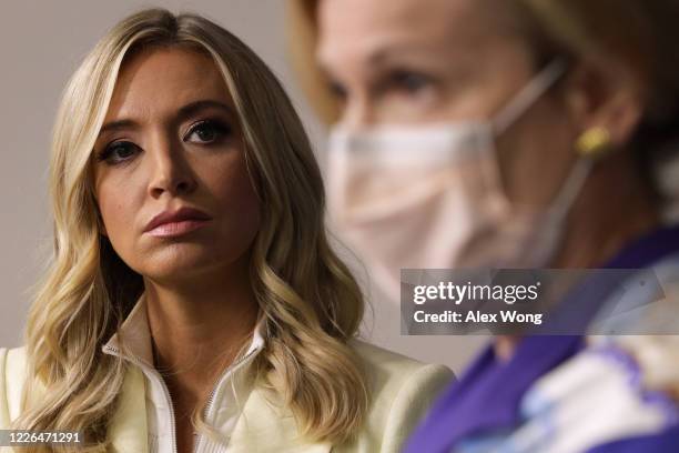 White House coronavirus response coordinator Deborah Birx speaks as White House Press Secretary Kayleigh McEnany looks on during a news briefing at...