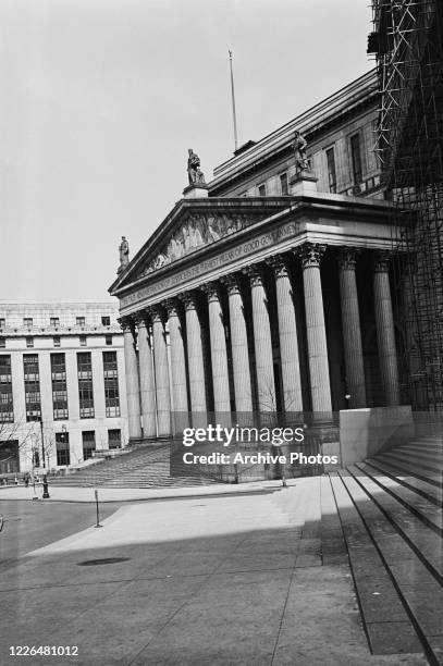 The New York State Supreme Court Building at 60 Centre Street in Manhattan, New York City, 18th April 1937. Around the frieze is the inscription 'The...