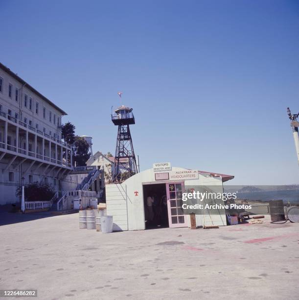 Signs reading 'Alcatraz Headquarters' and 'Visitors Register Here' during the Occupation of Alcatraz protest on Alcatraz Island, San Francisco, 1970....