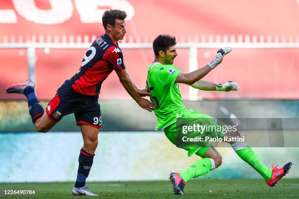 Andrea Pinamonti of Genoa pushes Karlo Letica of SPAL during the Serie A match between Genoa CFC and SPAL at Stadio Luigi Ferraris on July 12, 2020...