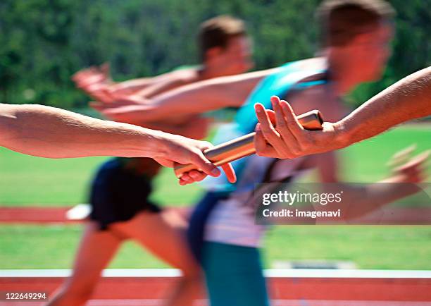 relay - twirling baton stock pictures, royalty-free photos & images