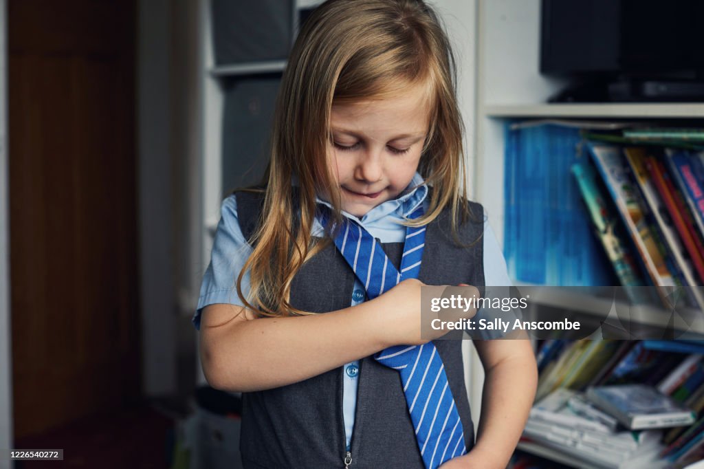 School child getting ready for school