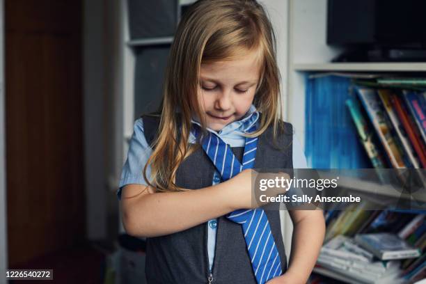 school child getting ready for school - school tie stock pictures, royalty-free photos & images