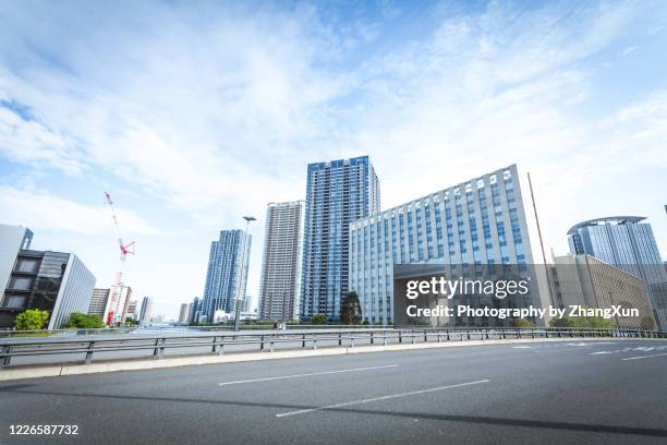 low angle view of tokyo city road, toyosu area, japan. - tokyo fashion stock pictures, royalty-free photos & images