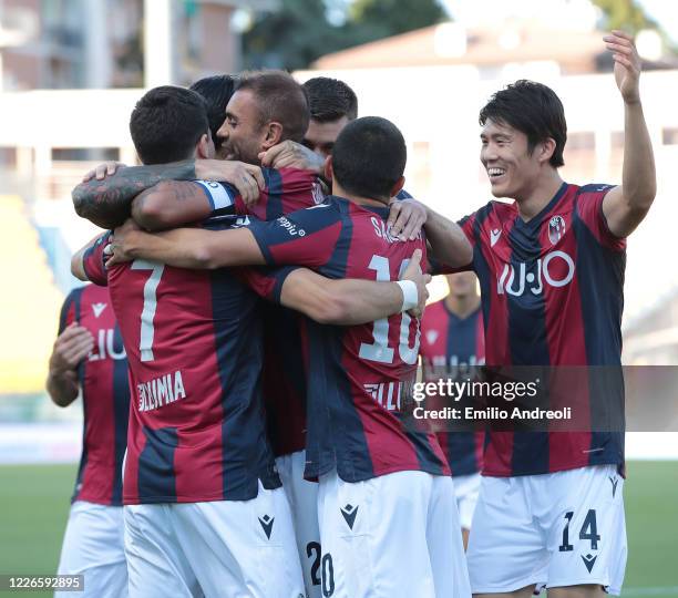 Danilo Larangeira of Bologna FC celebrates with his team-mates after scoring the opening goal during the Serie A match between Parma Calcio and...