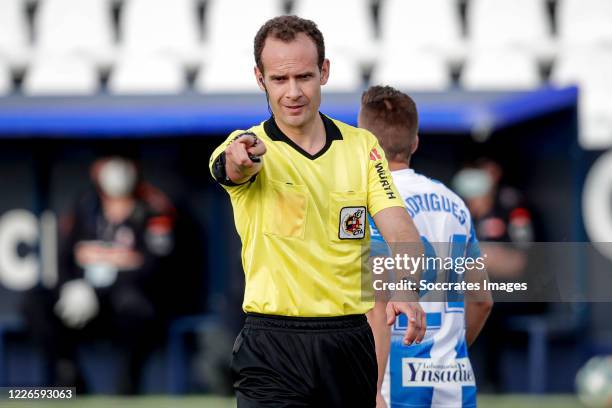 Referee Mario Melero gives a penalty during the La Liga Santander match between Leganes v Valencia at the Estadio Municipal de Butarque on July 12,...