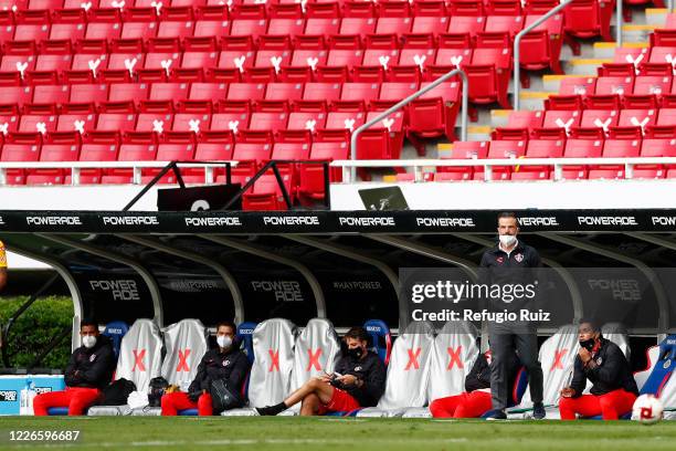 Rafael Puente coach of Atlas looks on during the match between Atlas and Tigres UANL as part of the friendship tournament Copa GNP por Mexico at...