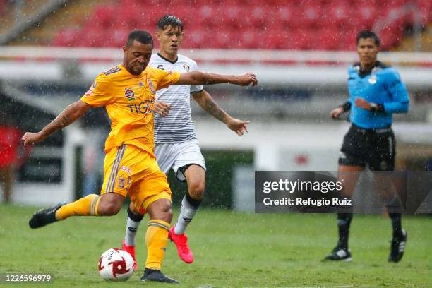 Aldo Lopez of Atlas fights for the ball with Rafael de Souza of Tigres during the match between Atlas and Tigres UANL as part of the friendship...