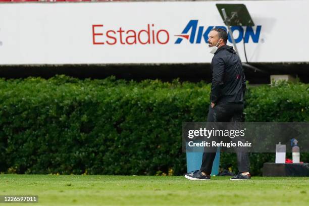 Rafael Puente coach of Atlas looks on during the match between Atlas and Tigres UANL as part of the friendship tournament Copa GNP por Mexico at...