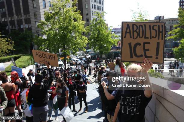 Protesters rally outside City Hall on July 12, 2020 in Seattle, Washington. Demonstrators called for the abolishment of U.S. Immigration and Customs...