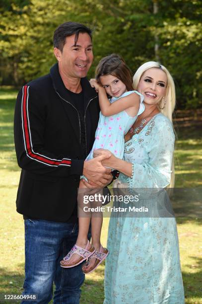 Daniela Katzenberger with her husband Lucas Cordalis and their daughter Sophia Cordalis during a photo call for her latest book "Die Mutti-Mafia kann...