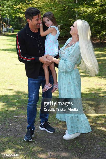 Daniela Katzenberger with her husband Lucas Cordalis and their daughter Sophia Cordalis during a photo call for her latest book "Die Mutti-Mafia kann...