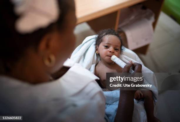 Nurse in an intensive care unit of Nyangya General Hospital in Nyangya. There are five incubators with respirators for premature babies on February...