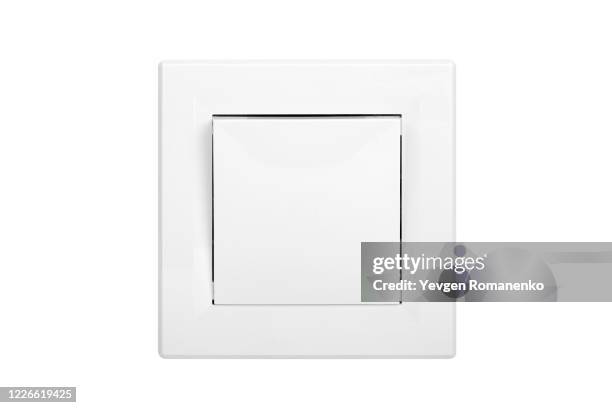 white light switch isolated on white background - lichtschalter stock-fotos und bilder