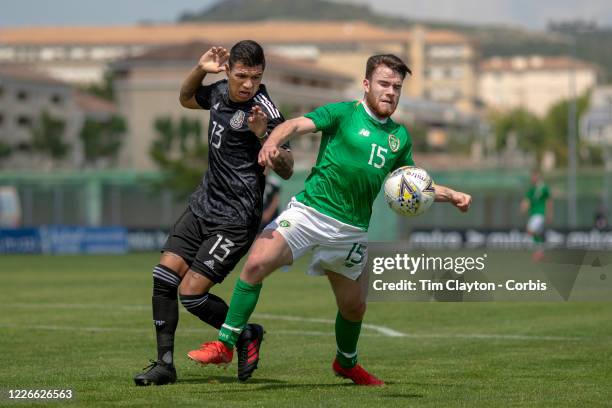 June 15. Aaron Connolly of the Republic of Ireland defended by Brayton Vazquez of Mexico during the Republic of Ireland U21 V Mexico U22, 3rd place...