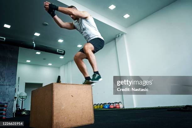 Boxed Getting Up Strong Man Lifting Box Photos and Premium High Res Pictures - Getty Images