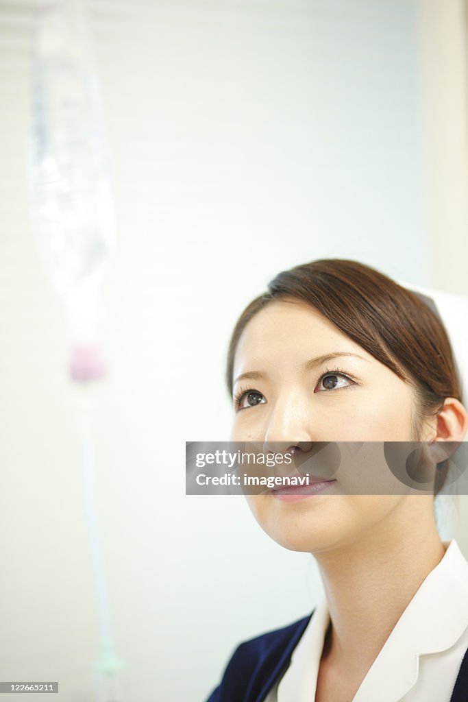 Nurse preparing for intravenous drip