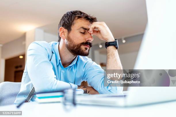 where did this headache suddenly come from? - computer crime stock pictures, royalty-free photos & images