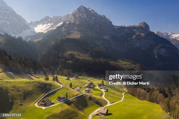 aerial view of the countryside near engelberg in canton obwalden in switzerland in the alps - schwyz stock pictures, royalty-free photos & images