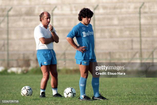 Diego Maradona and head coach Ottavio Bianchi of Napoli are seen during a training session at the Centro Paradiso di Soccavo on October 17, 1986 in...