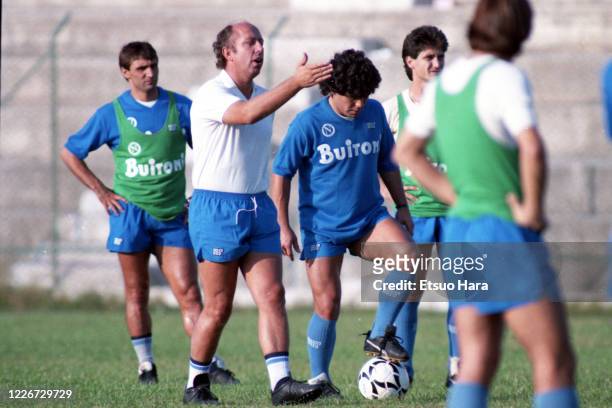 Diego Maradona and head coach Ottavio Bianchi of Napoli are seen during a training session at the Centro Paradiso di Soccavo on October 17, 1986 in...