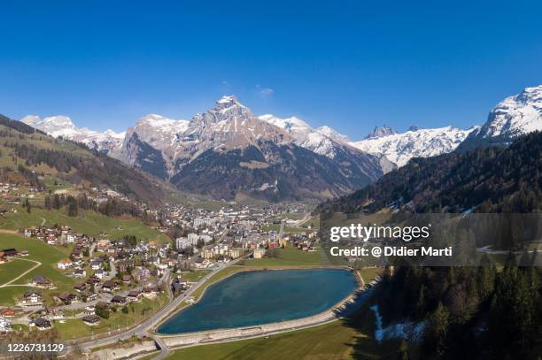 aerial view of the engelberg village in the alps in canton obwalden in switzerland - schwyz stock pictures, royalty-free photos & images