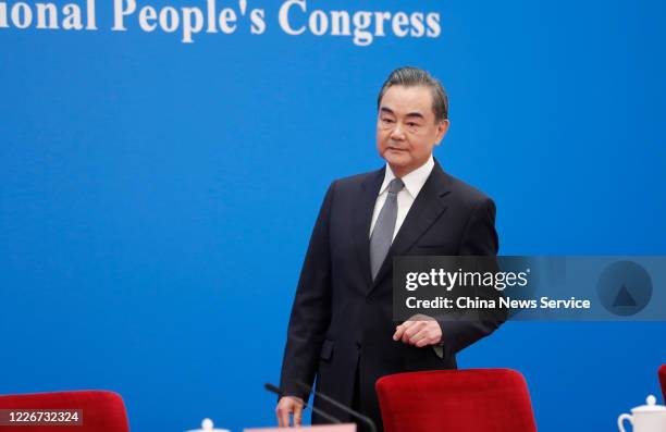 Chinese State Councilor and Foreign Minister Wang Yi attends a press conference of the third session of the 13th National People's Congress at the...