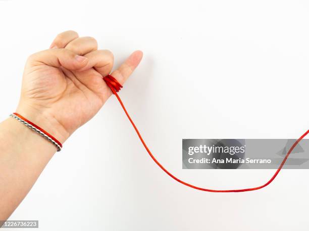 18 Red Thread Of Fate Stock Photos, High-Res Pictures, and Images ...