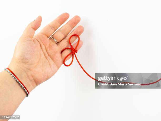 18 Red Thread Of Fate Stock Photos, High-Res Pictures, and Images ...