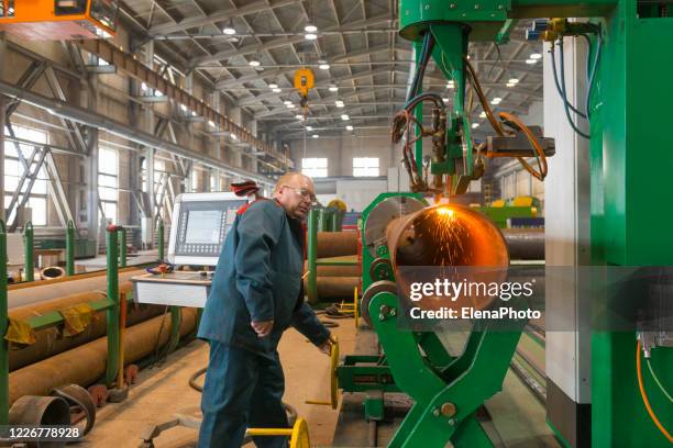 cnc plasma pipe cutting machine - photo laser engraving stock pictures, royalty-free photos & images