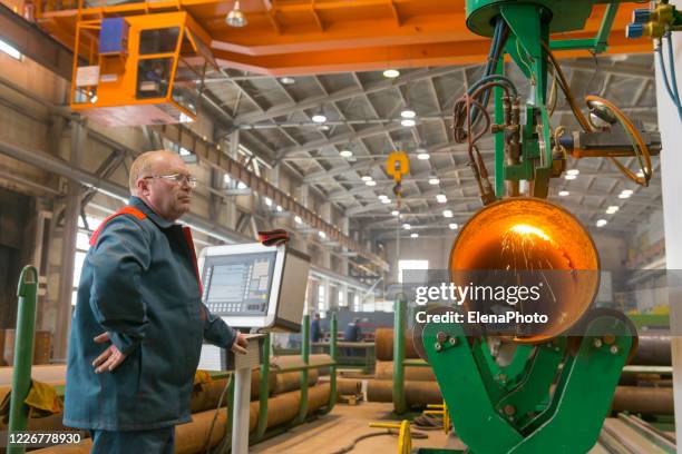cnc plasma pipe cutting machine - photo laser engraving stock pictures, royalty-free photos & images