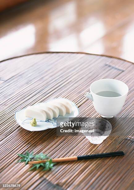 slices of white fish paste served with wasabi - wasabi paste stock pictures, royalty-free photos & images