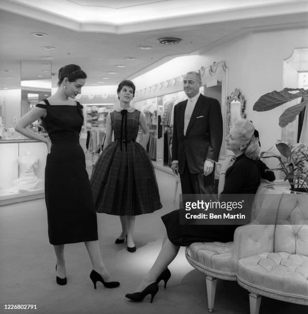Andrew Goodman head of Bergdorf Goodman, with models at the Fifth Avenue store, July 6, 1956.