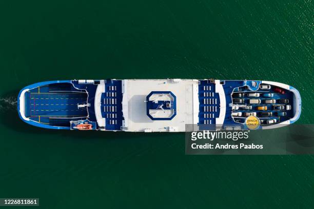 aerial top-down view of a passenger ferry, loaded with cars - car ferry stock pictures, royalty-free photos & images