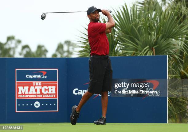 Tiger Woods plays his shot from the seventh tee during The Match: Champions For Charity at Medalist Golf Club on May 24, 2020 in Hobe Sound, Florida.