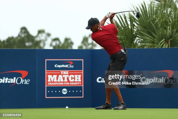 Tiger Woods plays his shot from the seventh tee during The Match: Champions For Charity at Medalist Golf Club on May 24, 2020 in Hobe Sound, Florida.