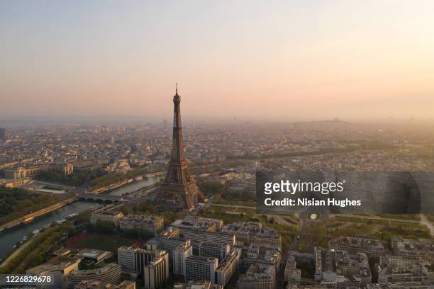 aerial view of eiffel tower in paris france, sunrise - paris foto e immagini stock