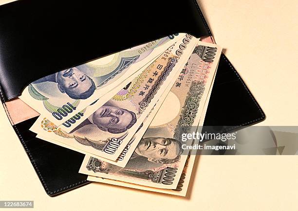 japanese yen - five thousand yen note stock pictures, royalty-free photos & images