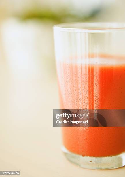 a glass of tomato juice - tomato juice stock pictures, royalty-free photos & images