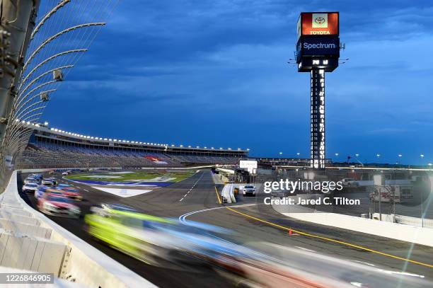 Cars raceduring the NASCAR Cup Series Coca-Cola 600 at Charlotte Motor Speedway on May 24, 2020 in Concord, North Carolina.