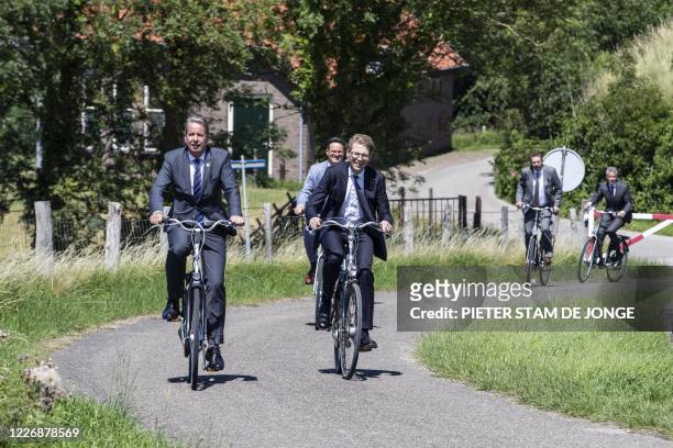 Dutch Minister Sander Dekker of Legal Protection on the way by bicycle to the intended location for the extra secure prison in the southwestern...