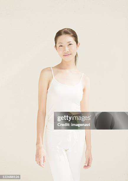 a young woman - camisola stock-fotos und bilder